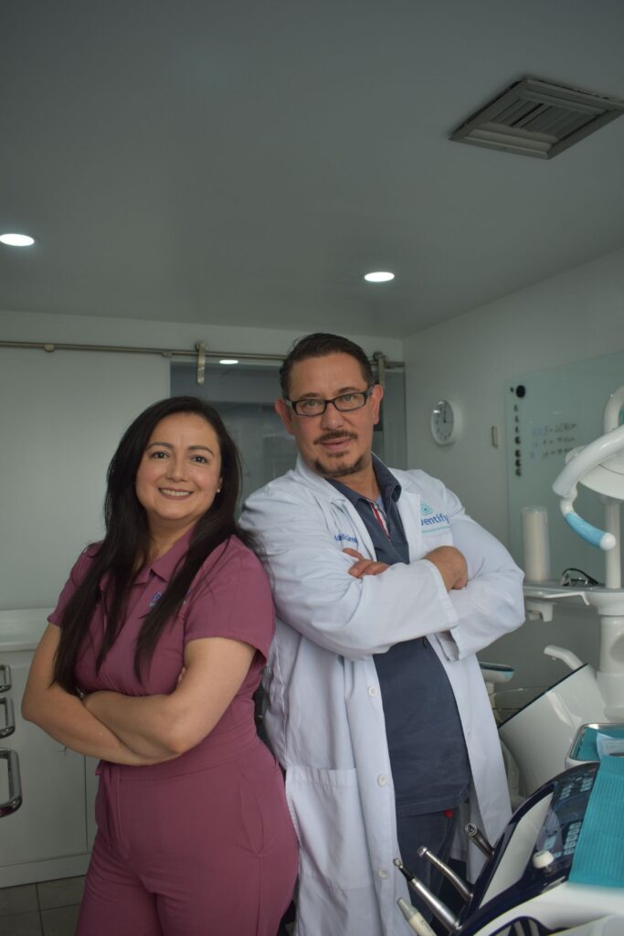 Dental professionals standing together in a modern clinic