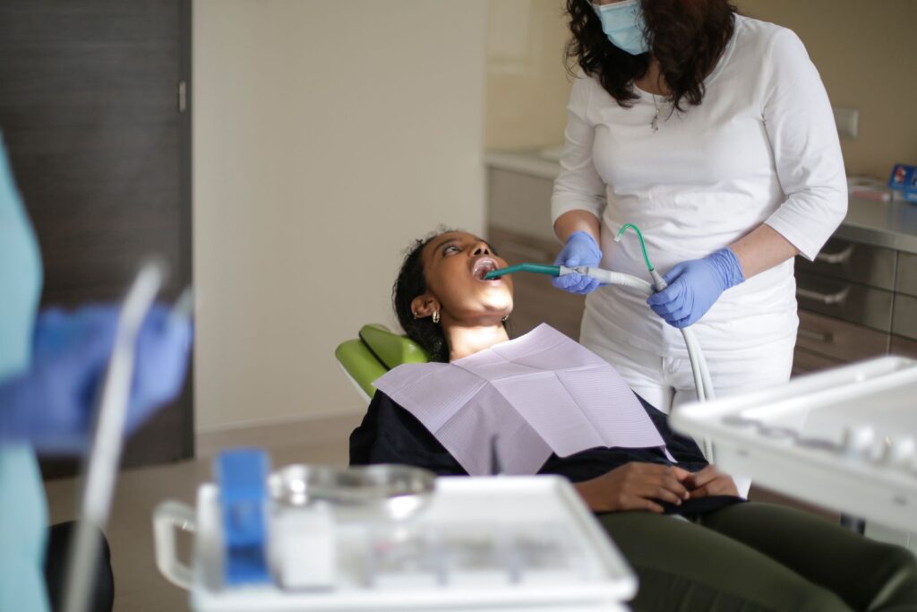 Dental professional performing restorative dental work